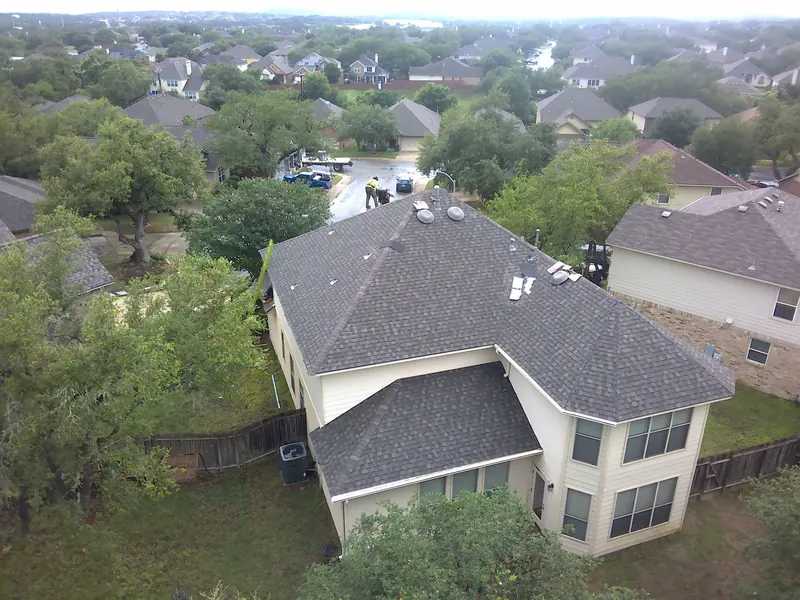 Aerial view of an HWT Construction roofing job site in Central Texas