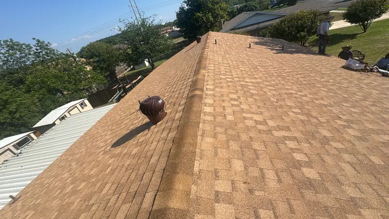 Completed hail-damage roof replacement in Central Texas