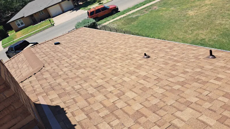 Completed roof replacement viewed from the ridge in Central Texas