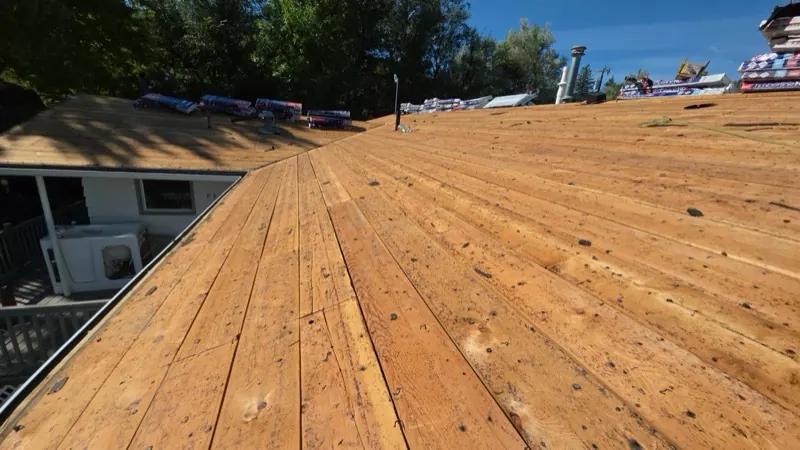 Exposed roof decking after shingle tear-off in Havre, MT