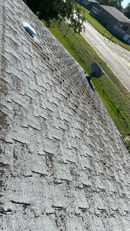 Granule loss caused by hail impact