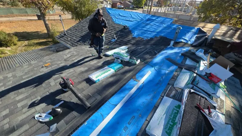New shingles being installed on a Havre, MT home
