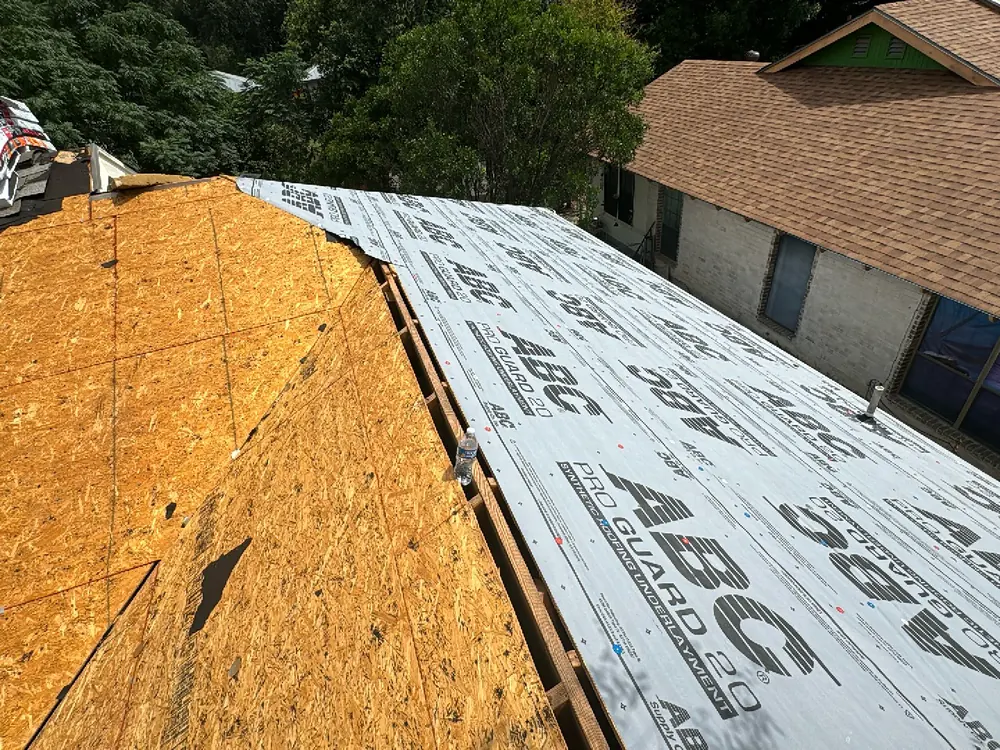 ABC Pro Guard 20 synthetic underlayment rolled out over fresh decking on a Central Texas roof